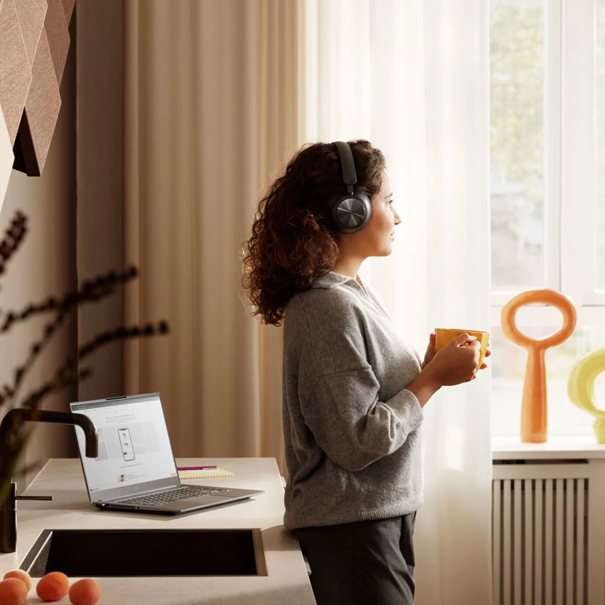 Person enjoying the sound quality of the Beoplay Portal