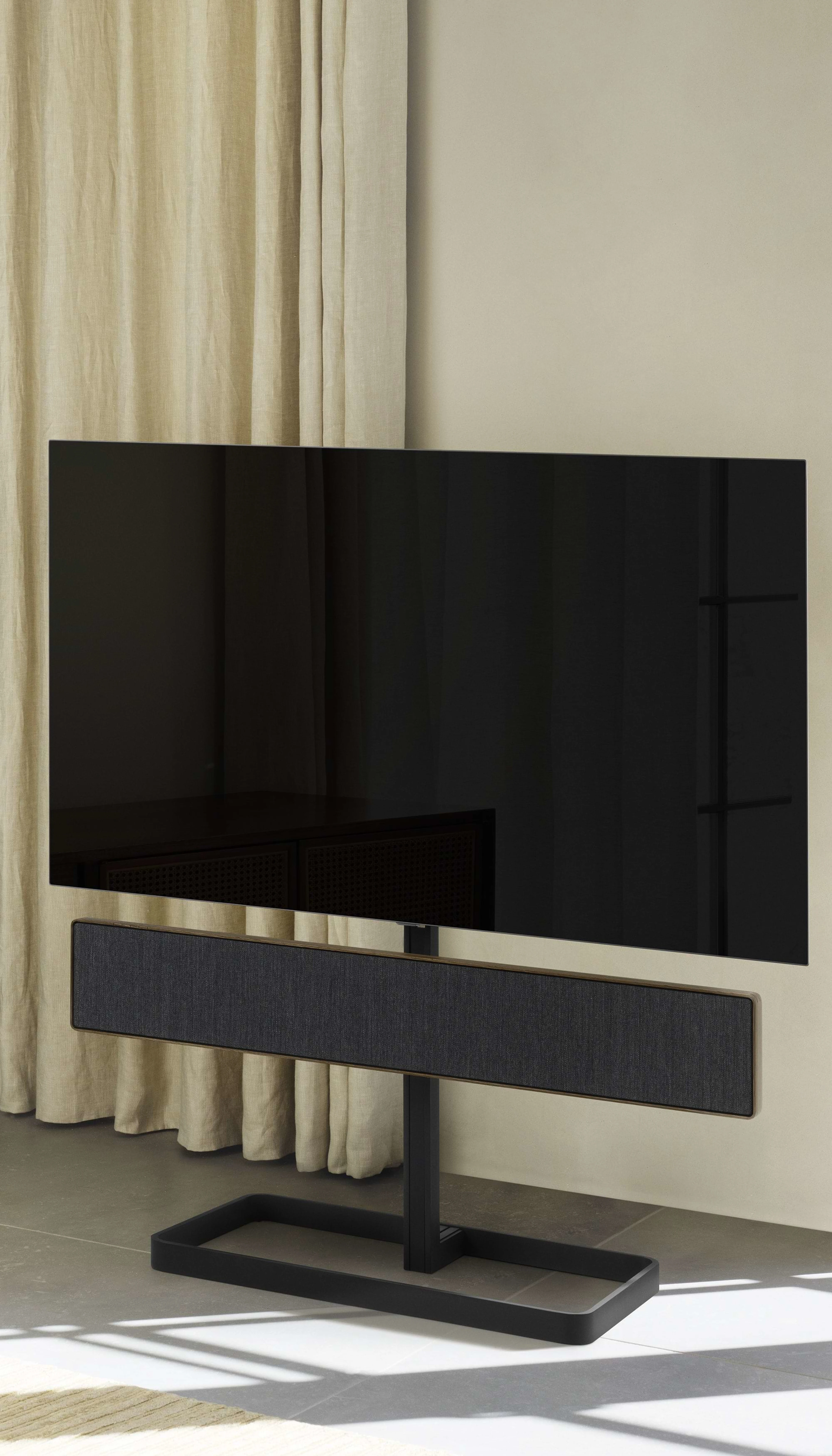 Beosound stage on a tv stand in living room