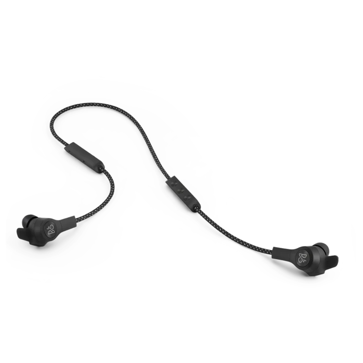 Beoplay E6 earphones on man with black tshirt