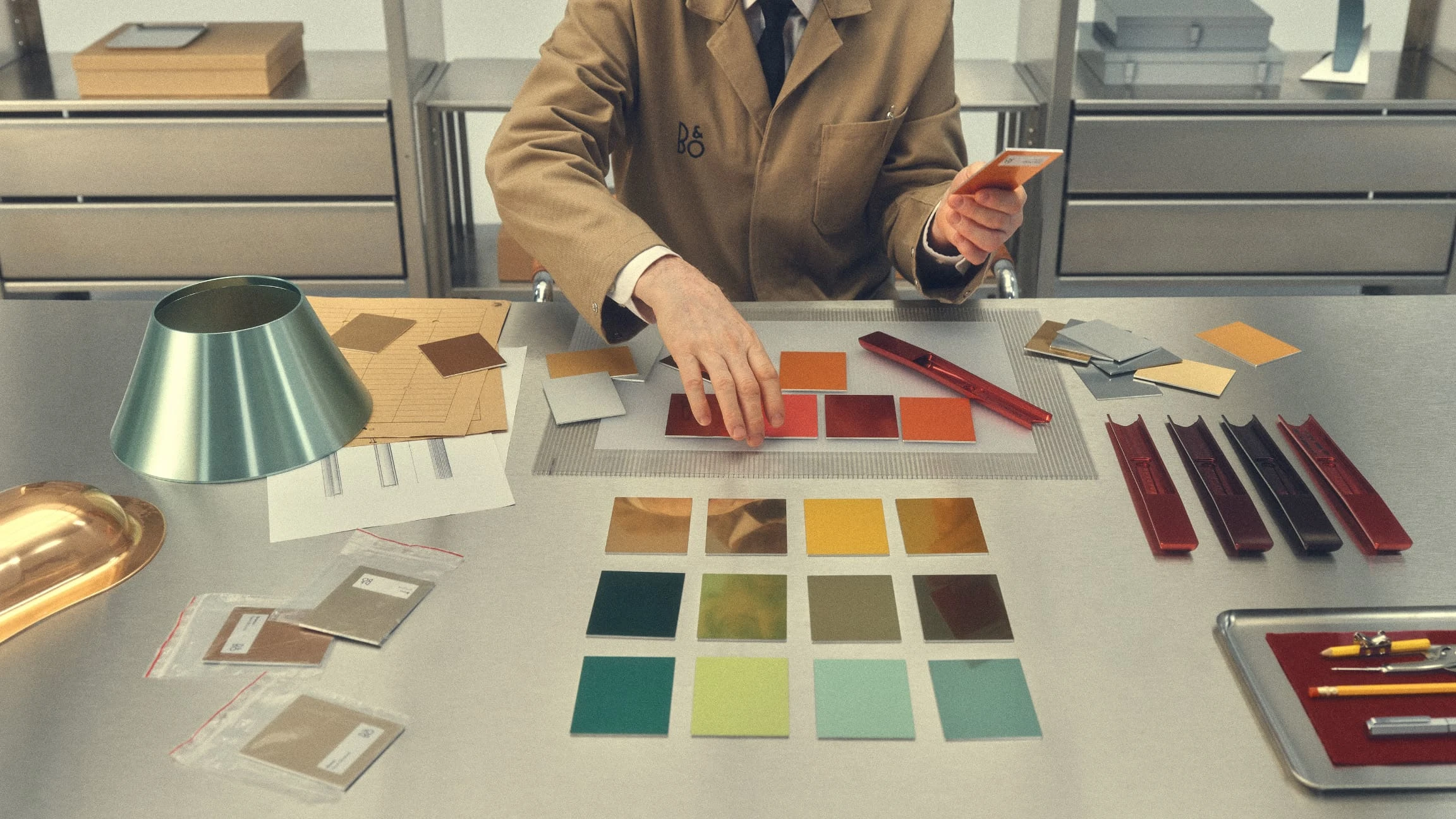 Person sorting out colour samples