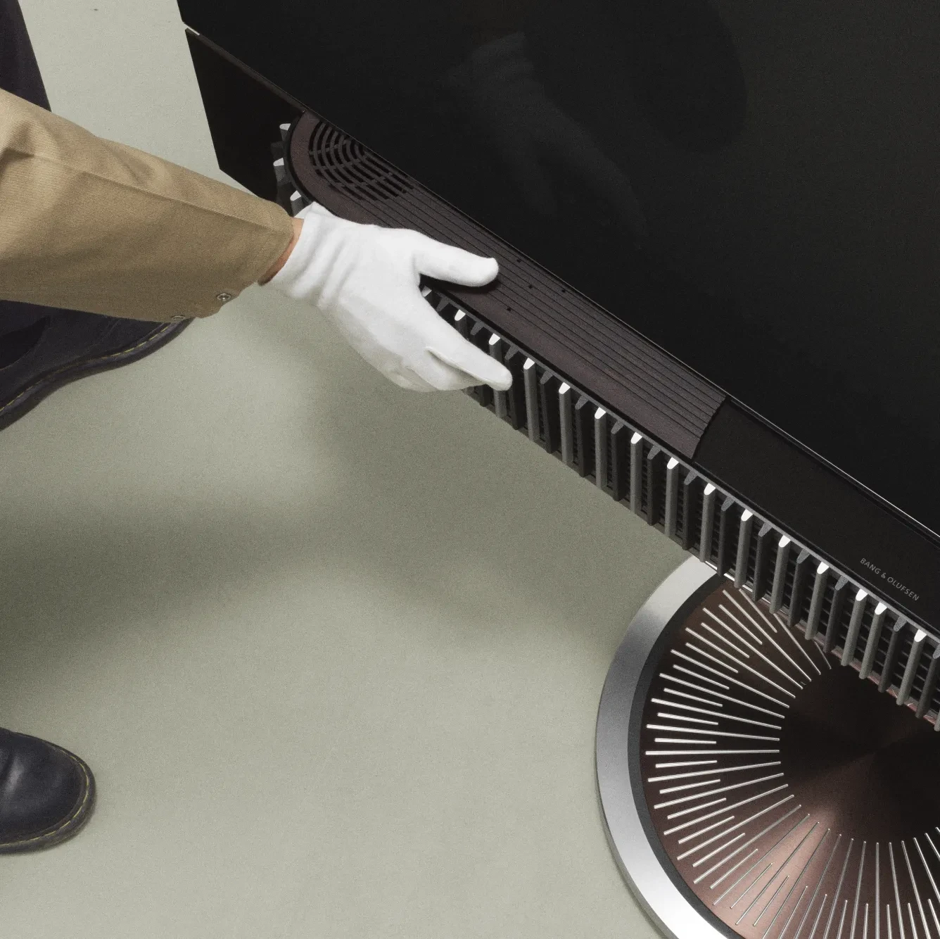 Image of a hand touching the Beovision Theatre