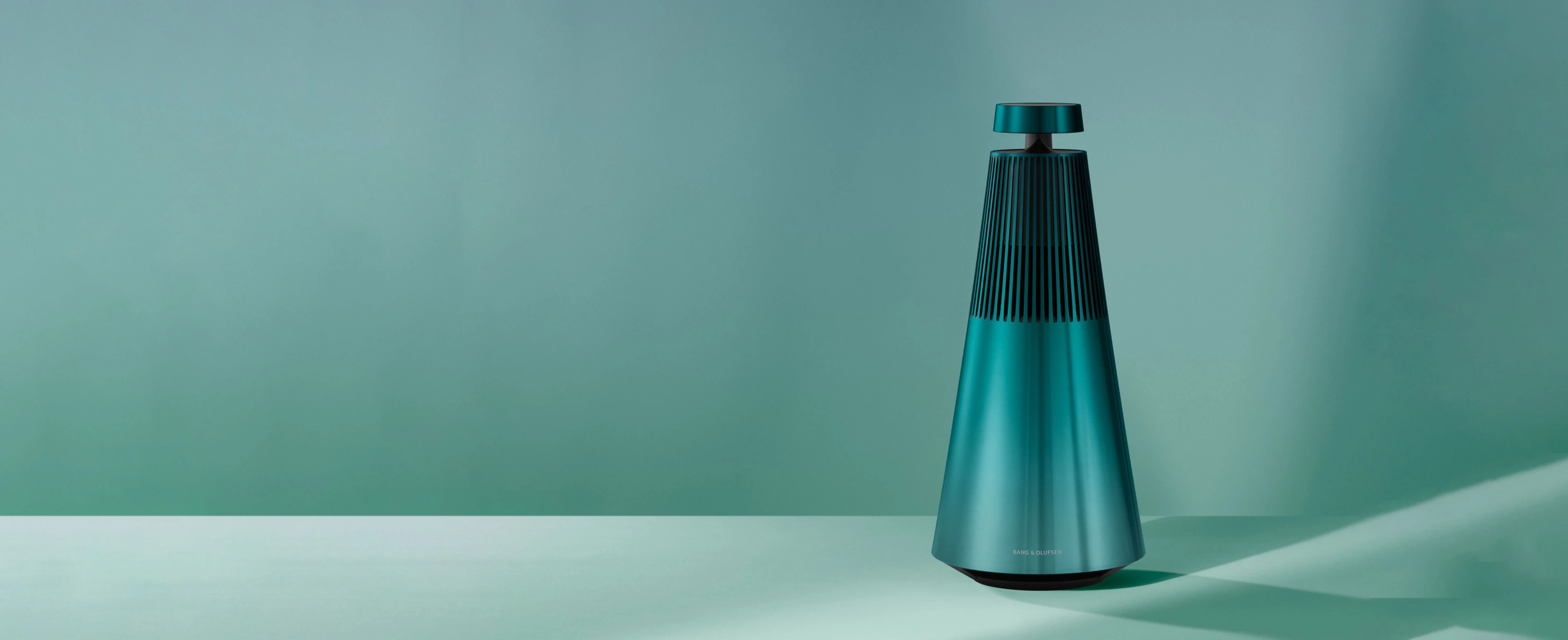 The Beosound 2 speaker in the limited Atelier colour Northern Sky Turquoise