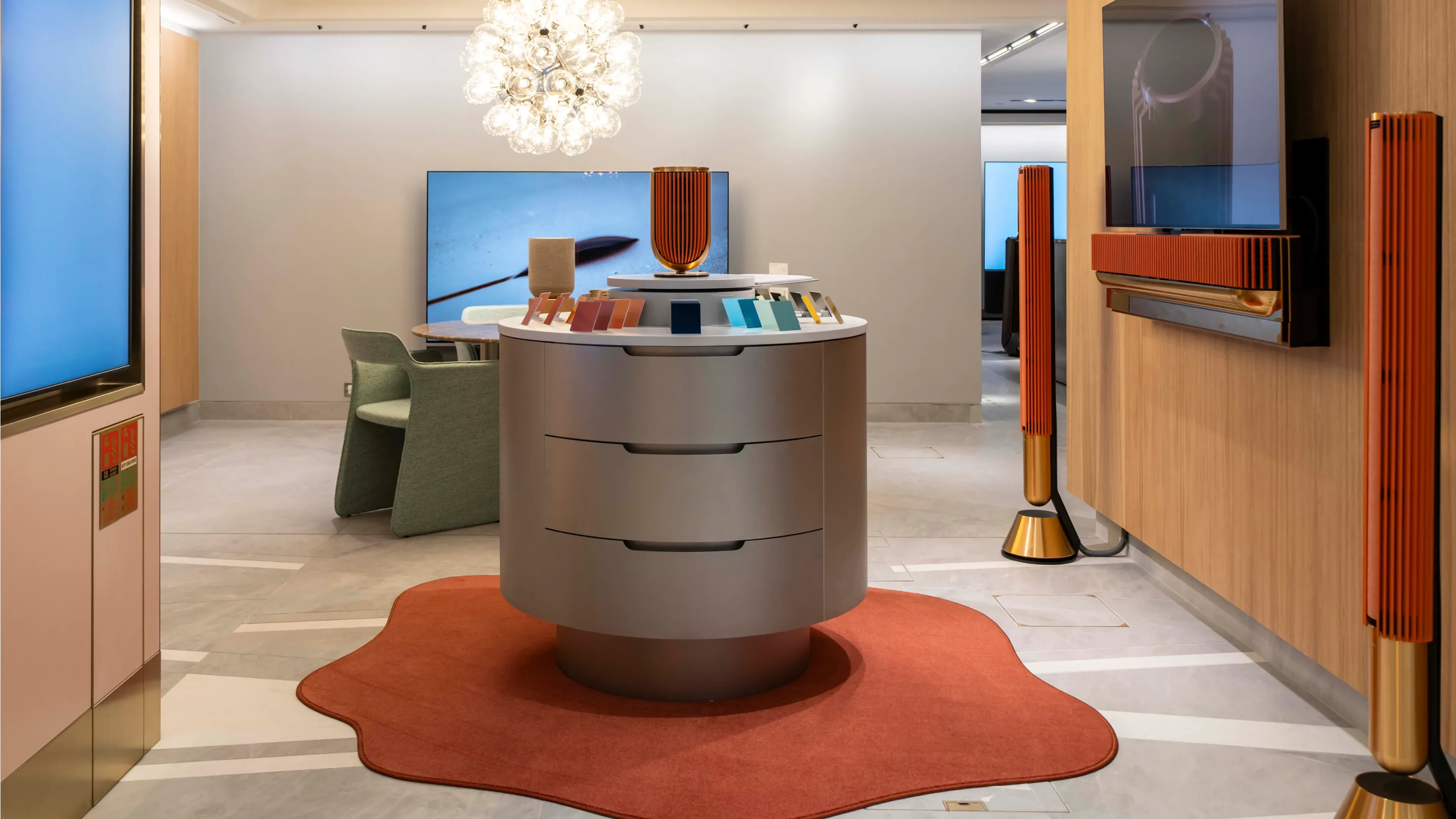 Atelier cabinet displaying colour and texture palettes for speaker customisation, located at Bang & Olufsen Harrods, London
