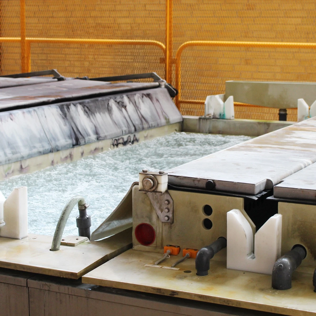 Aluminium baths in the bang and Olufsen factory in Struer Denmark