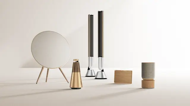 Beosound Balance and a pair of Beolab 28 Speakers in a living room with table and chairs 