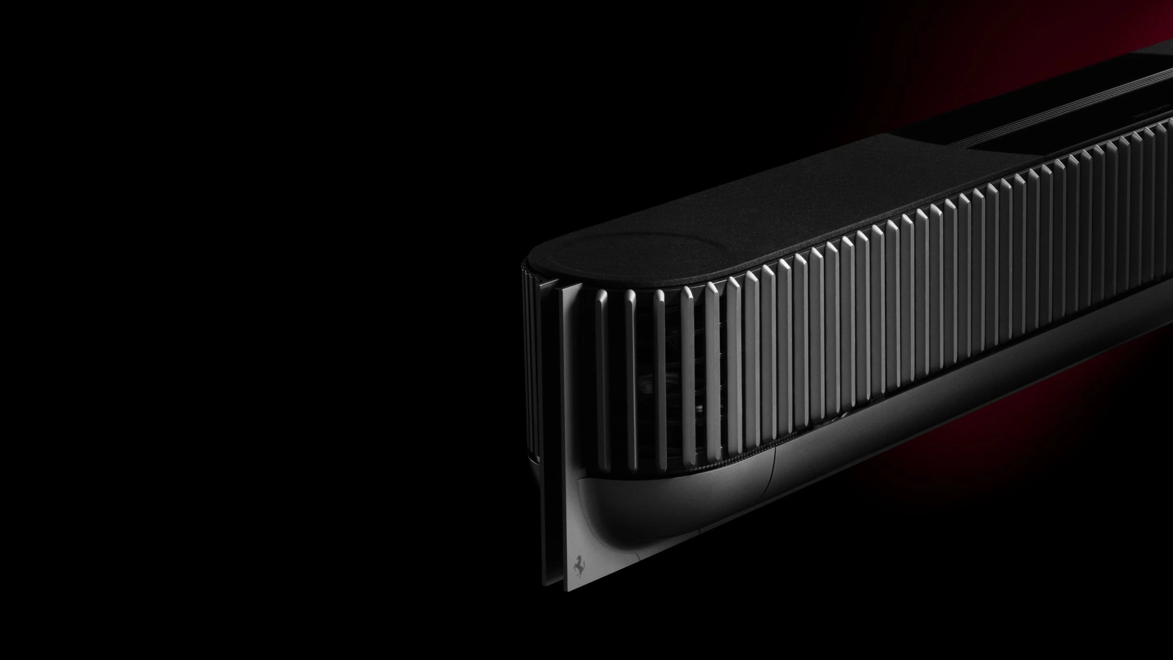 Left side of Beosound Theatre Ferrari edition soundbar that you can see a Ferrari logo on the left bottom