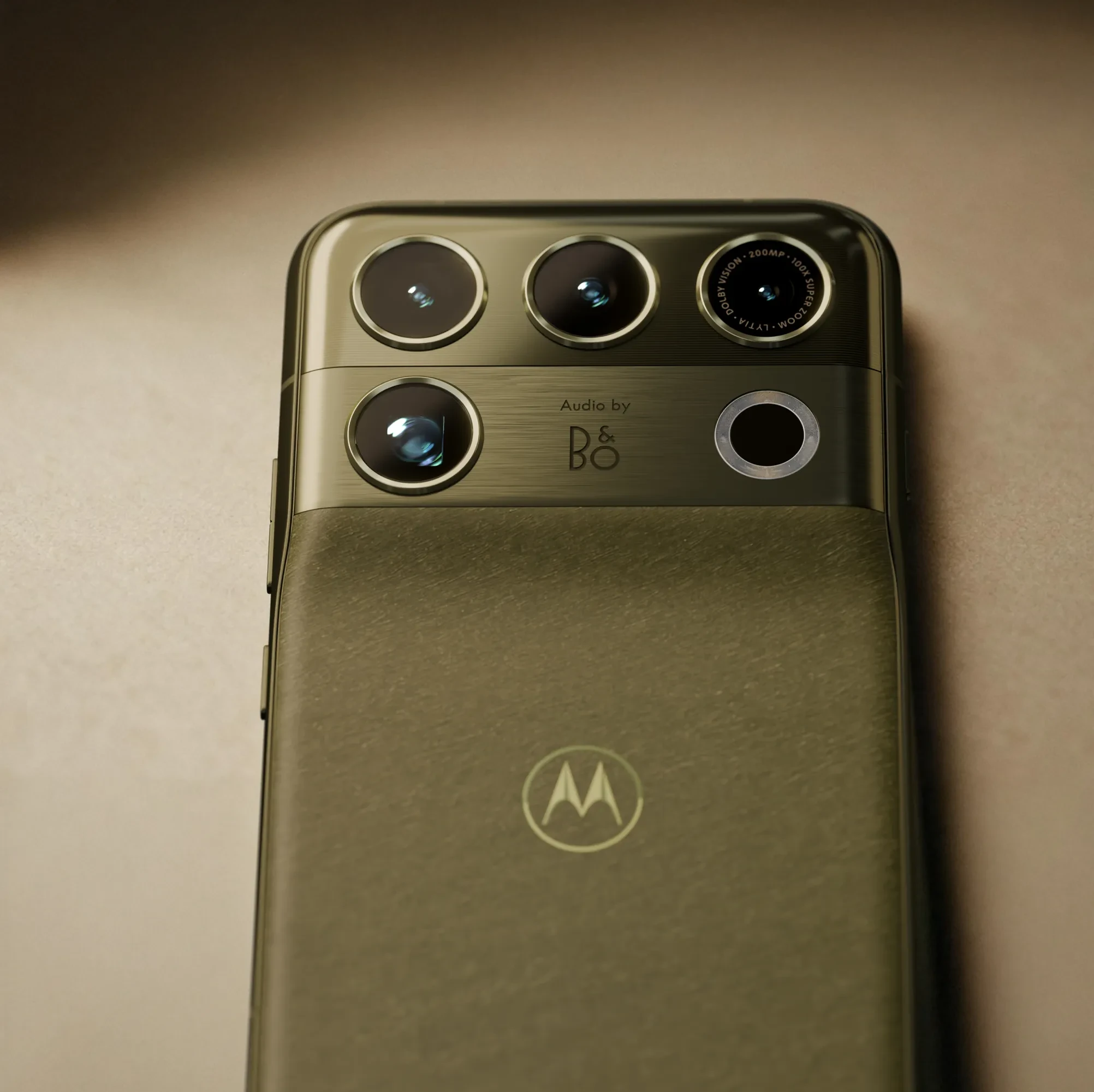 Motorola Edge smartphone in green, featuring Audio by Bang & Olufsen branding.
