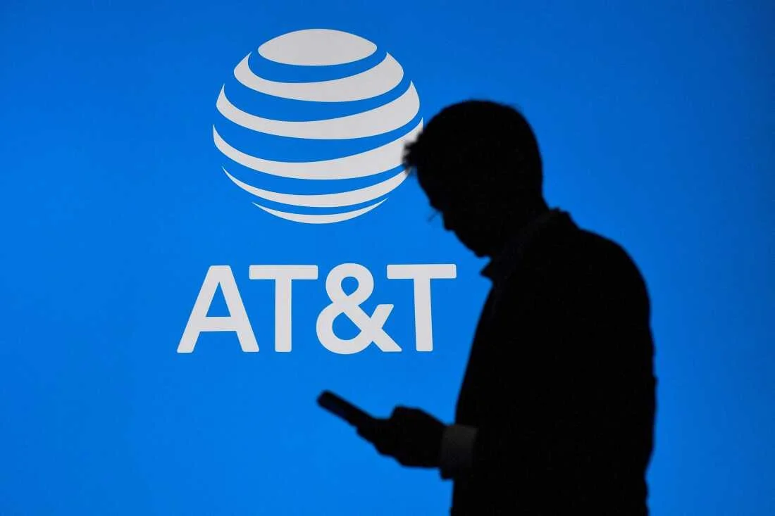 AT&T logo with a silhoutte