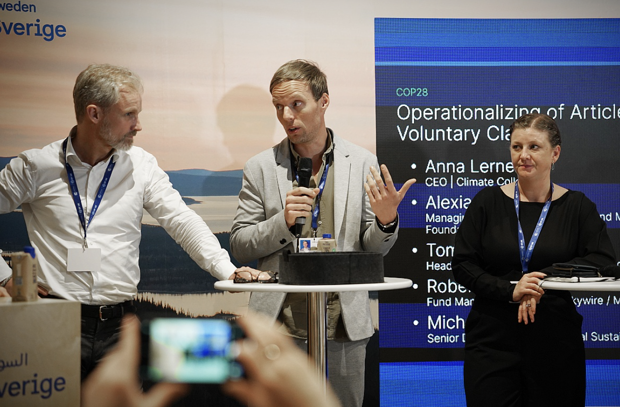 Robert Höglund, CTF manager at Milkywire ín a panel in the Swedish pavilion with Nasdaq, ICVM and Microsoft on voluntary carbon markets and Article 6. Tomas Thyblad, Nasdaq and Alexia Kelly, ICVCM, in the picture. 