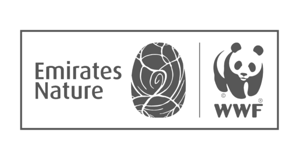 Grayscale logo featuring "Emirates Nature" text, a circular nature emblem, and the WWF panda icon side by side.