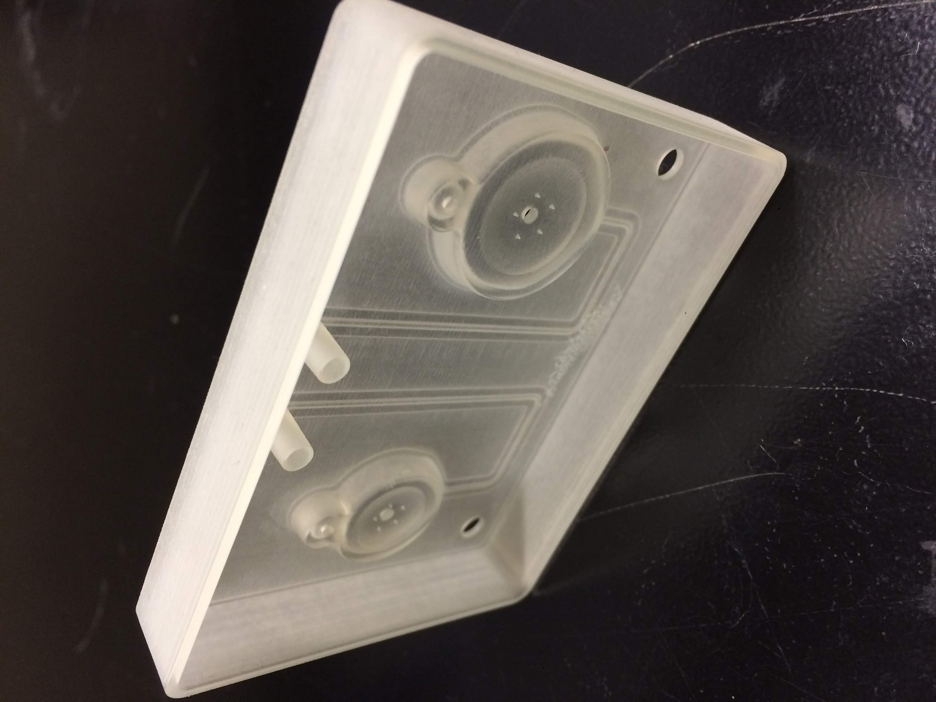 I designed a blister expression chamber implemented in the first-to-market marijuana breathalyzer (microfluidic device). This is an early 3D printed prototype