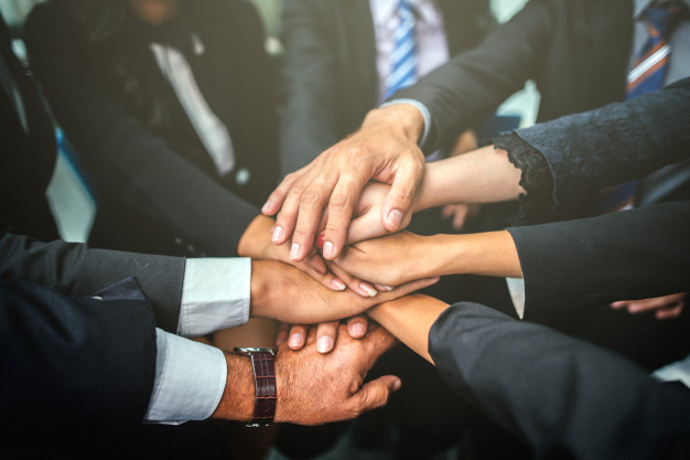 business-team-stack-hands-support-teamwork-concept 