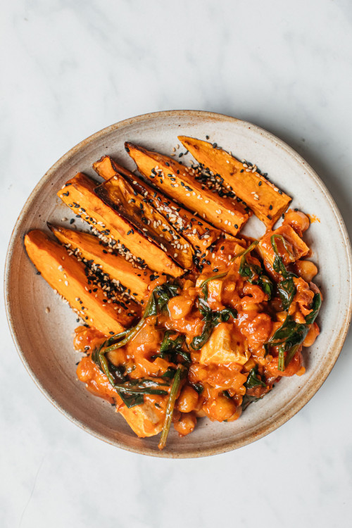 Chickpea, Tofu & Harissa Stew With Sweet Potato Wedges