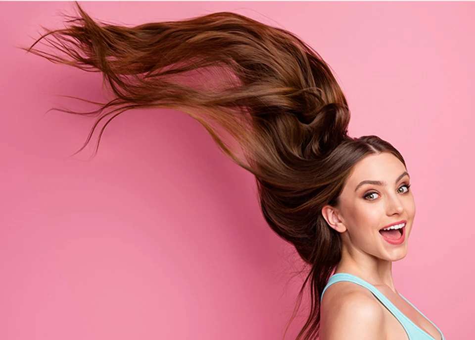 Portrait of her she nice attractive lovely cheerful cheery long straight-haired girl ideal perfect clean smooth hair flying anti dander dandruff medicine isolated on pink pastel color background