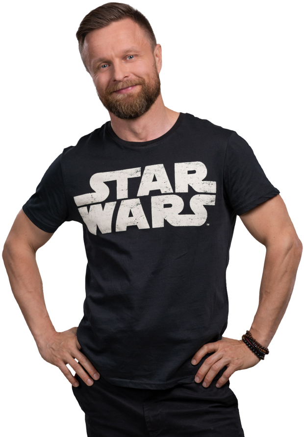 A man with star wars shirt smiling