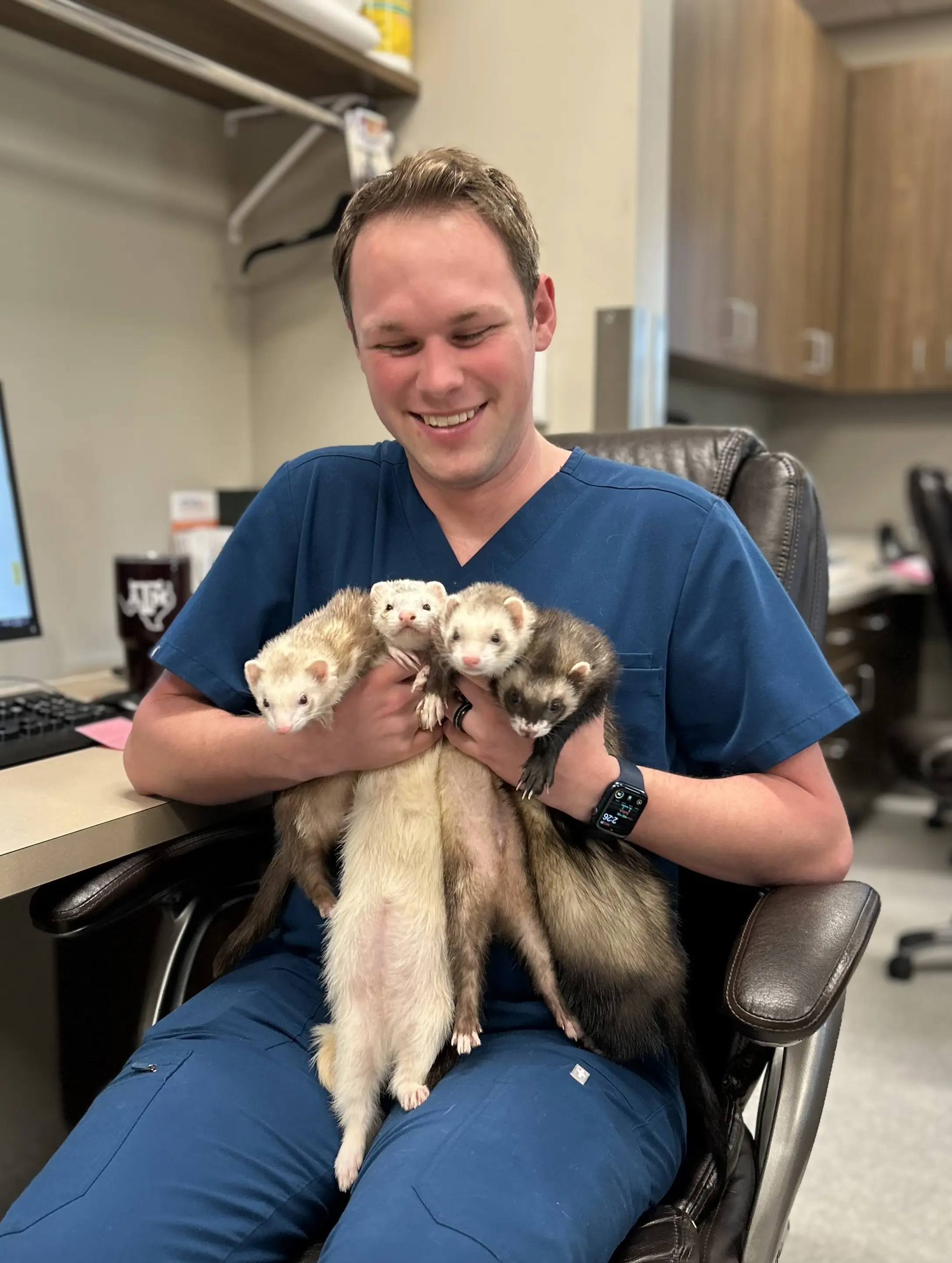 Austin Coull with ferrets at Viticus bootcamp