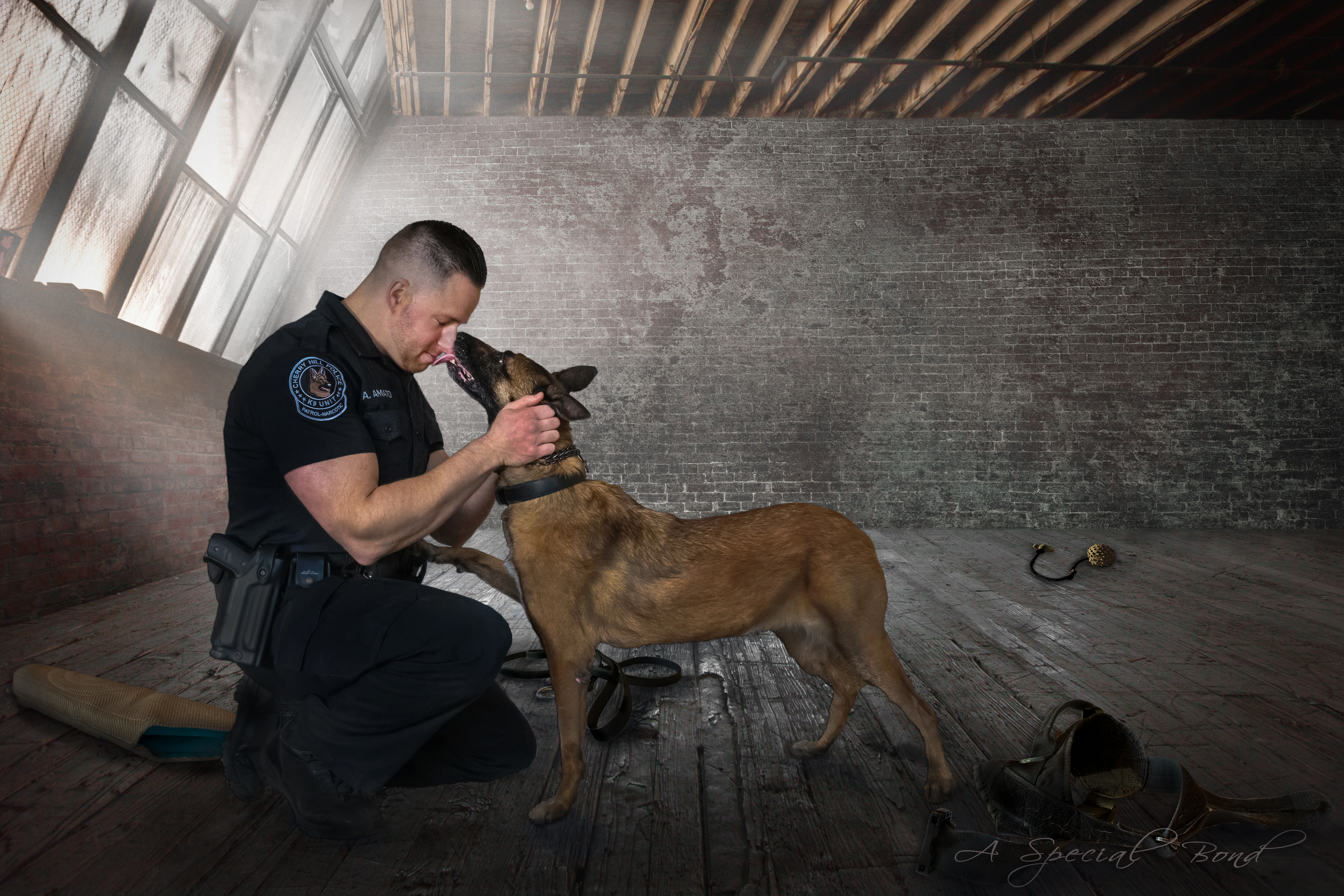 Officer Anthony Amato kneeling with his K-9 Mai of the Cherry Hill Police Department