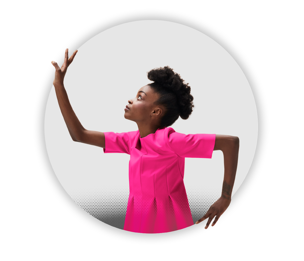 Woman dressed in pink standing inside a hexagon shape