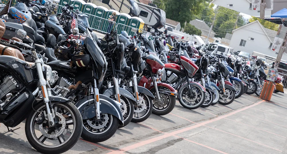 Picture of a lot of motorcycles lined up
