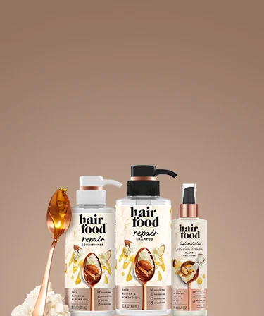 Hair Food Repair Collection Products on a brown background.