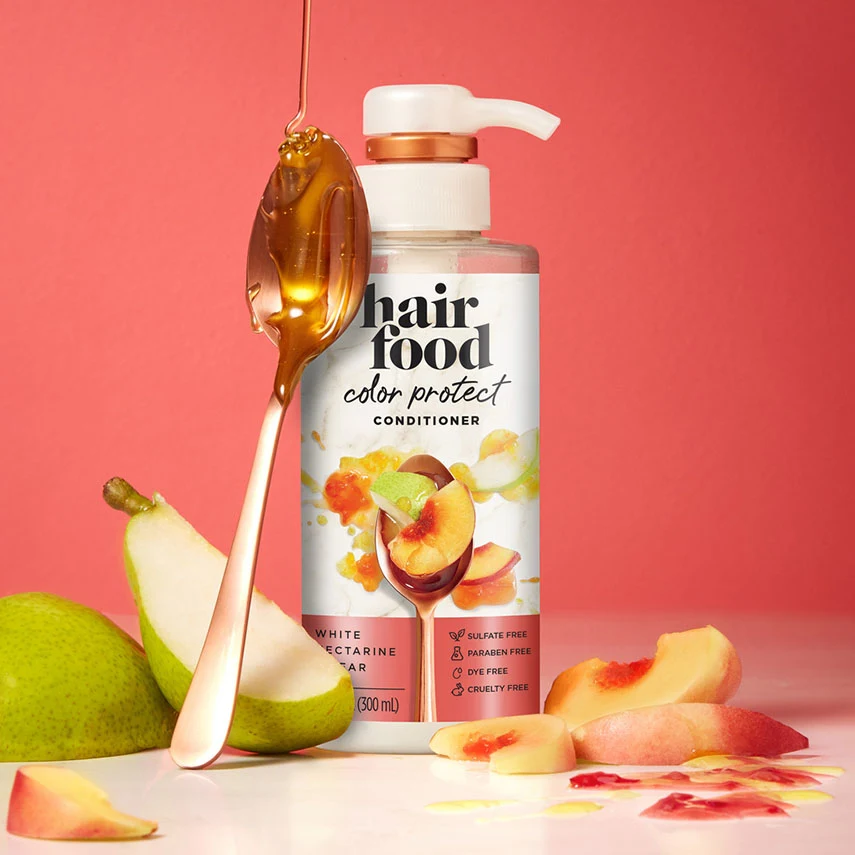 Hair Food White Nectarine & Pear Color Protect Conditioner bottle with white nectarine and pear ingredients