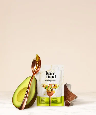 Hair Food mask sachets with coconut and avocado ingredients and copper spoon