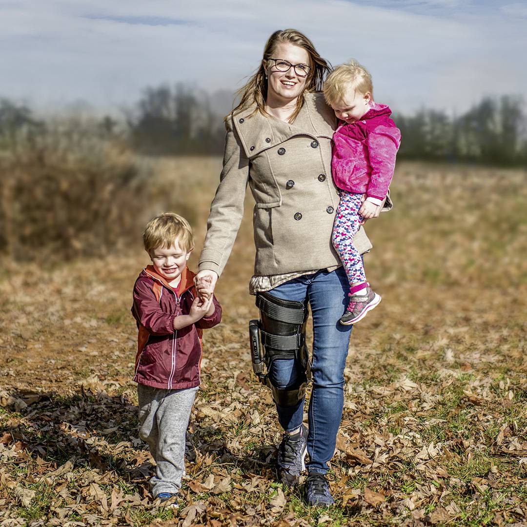 A family of three with orthotics.