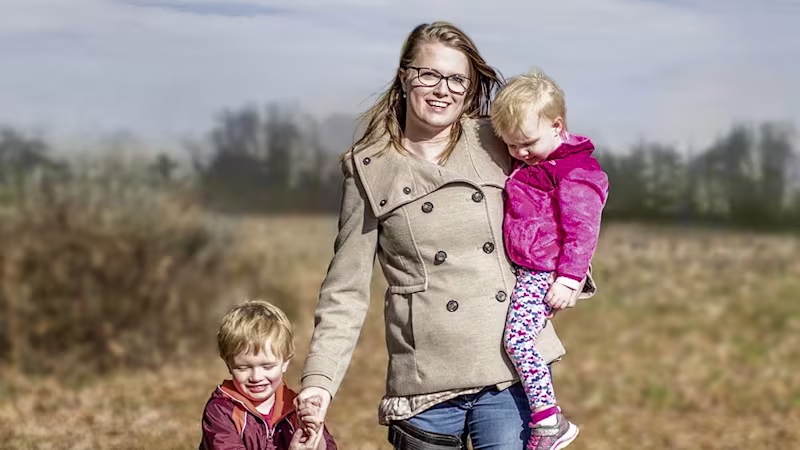A family of three with orthotics.