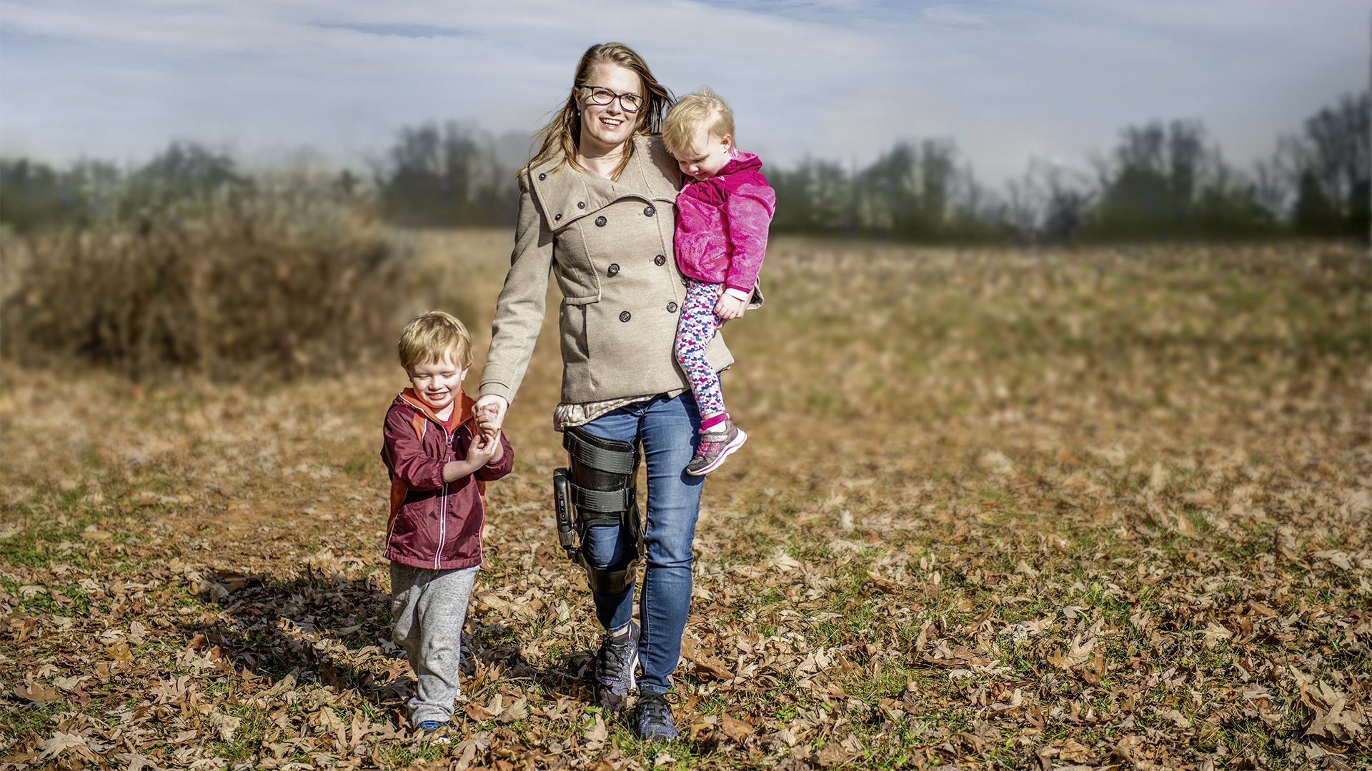 A family of three with orthotics.