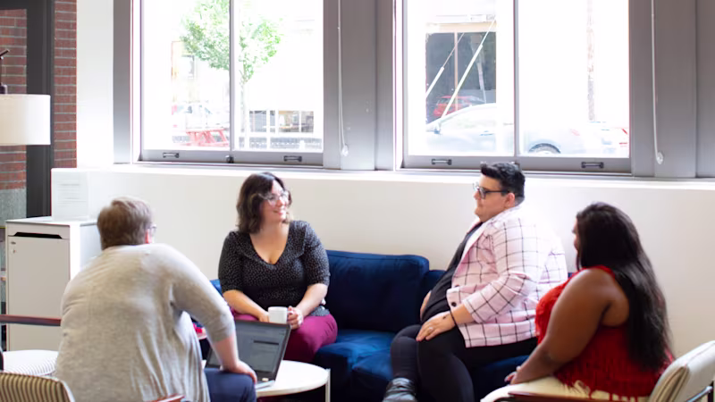 Professionals in a meeting setting
