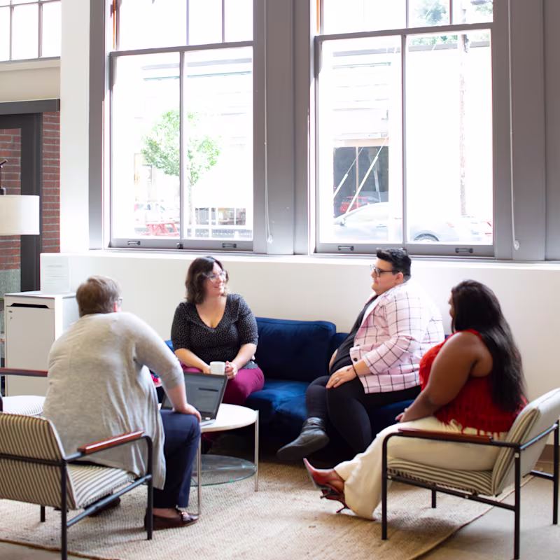 Professionals in a meeting setting