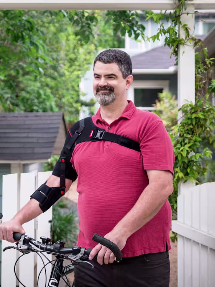 Patient recovering from Stroke with Omo Neurexa. Riding a bicycle.