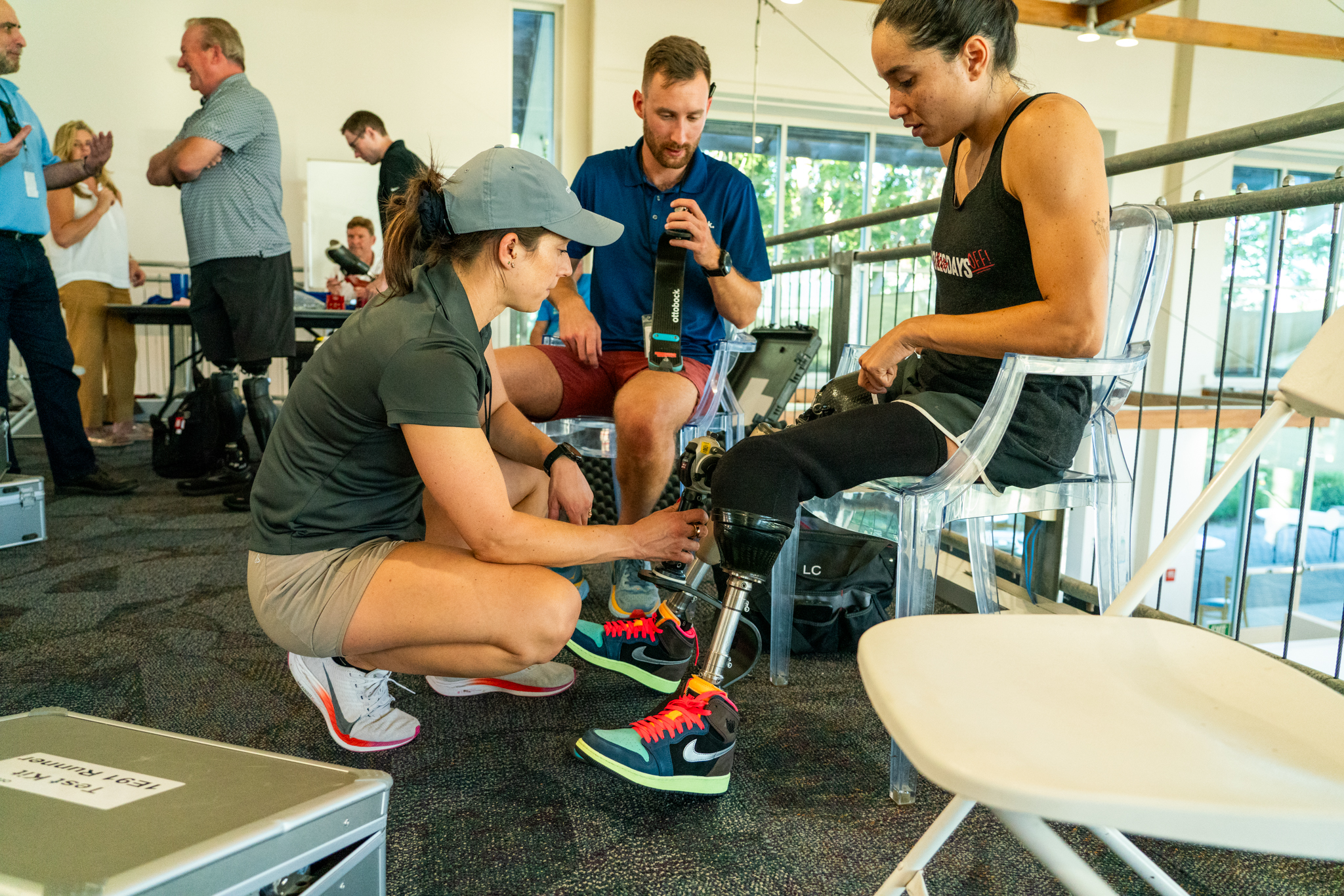 An amputee getting measured for an Ottobock prosthetic running leg