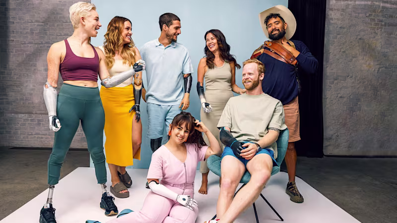 A group of bionic hand users show off their custom Ottobock prosthetic arms