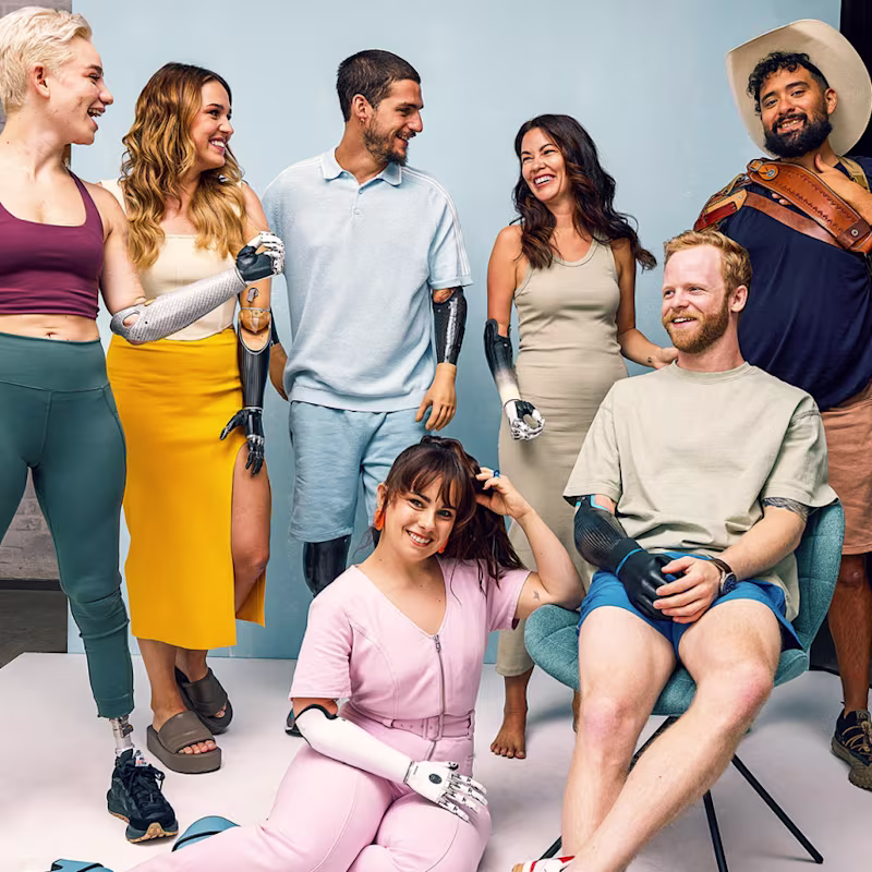 A group of bionic hand users show off their custom Ottobock prosthetic arms