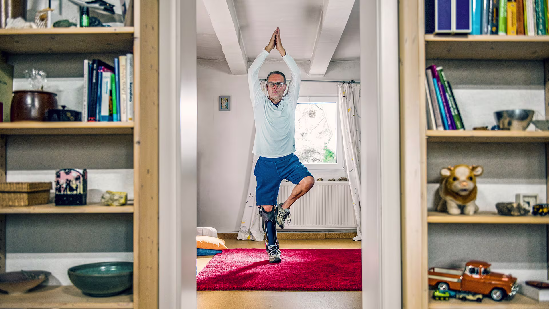 Ottobock C-Brace orthosis user practising Yoga