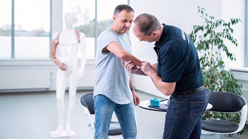 A CPO checks the user’s residual limb.