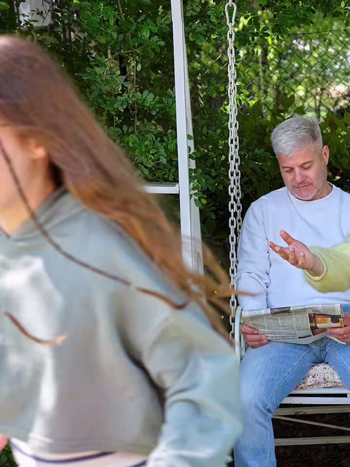 Family is happy in the garden.