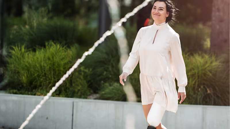 Walking in Soho London, Alt text: Rebecca is walking through London with her C-Leg.