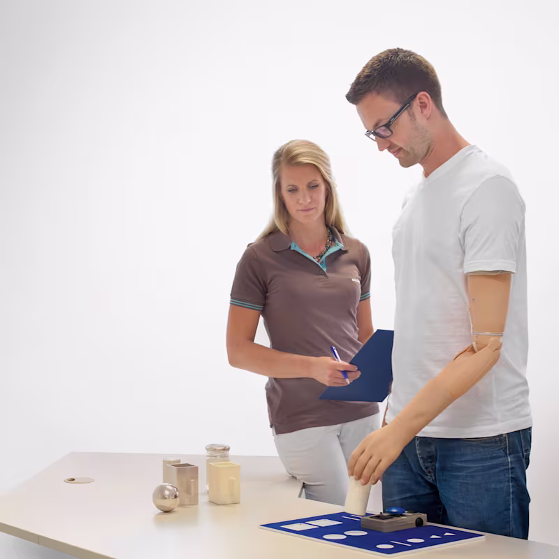 Two Prosthetist reviewing a custom product