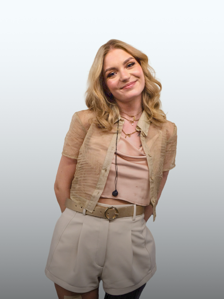 Portrait of Anna Osicki dressed for Eurovision live performance.