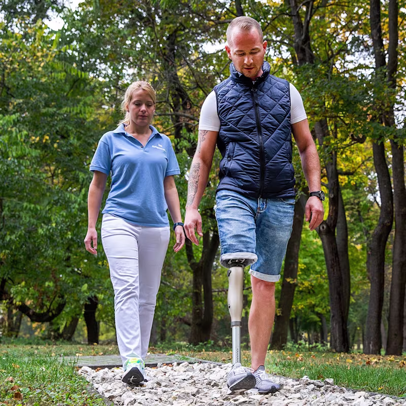 Laszlo with therapist in a training