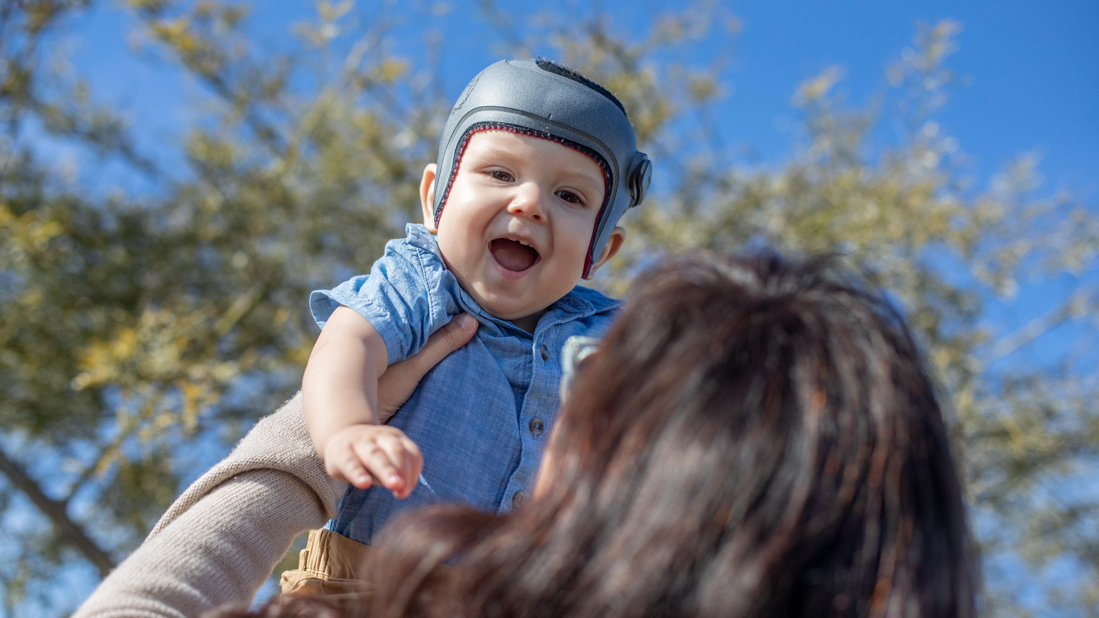 A parent playing with their child