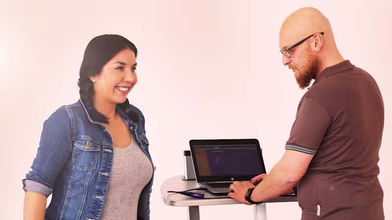 An Ottobock MPK user works with her prosthetist to calibrate her microprocessor knee.
