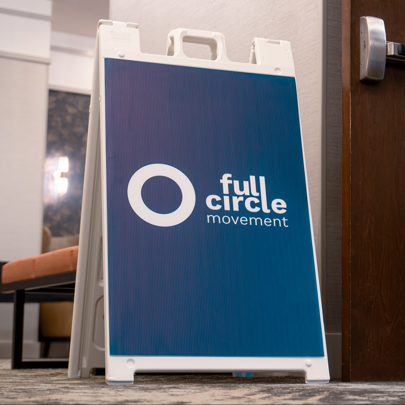 A branded sign for the Full Circle Movement event
