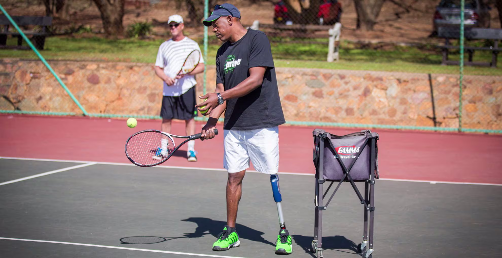 Patrick plays tennis with a 3R80