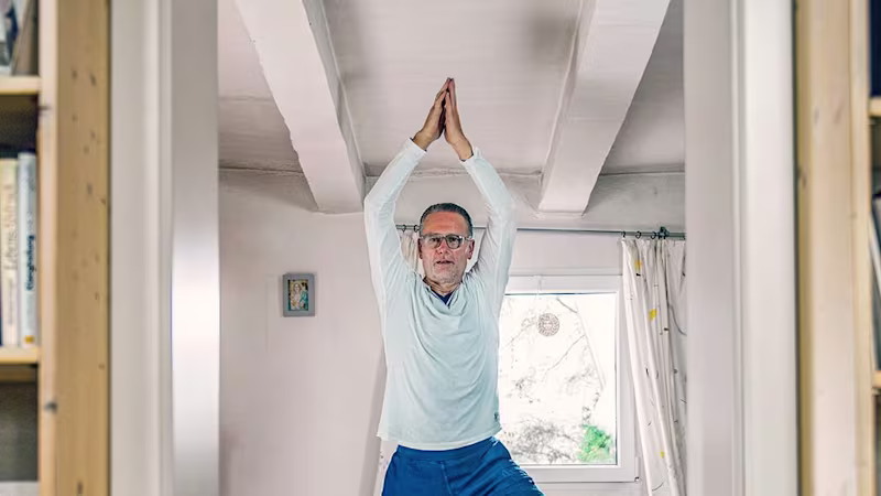 Ottobock C-Brace orthosis user practising Yoga.