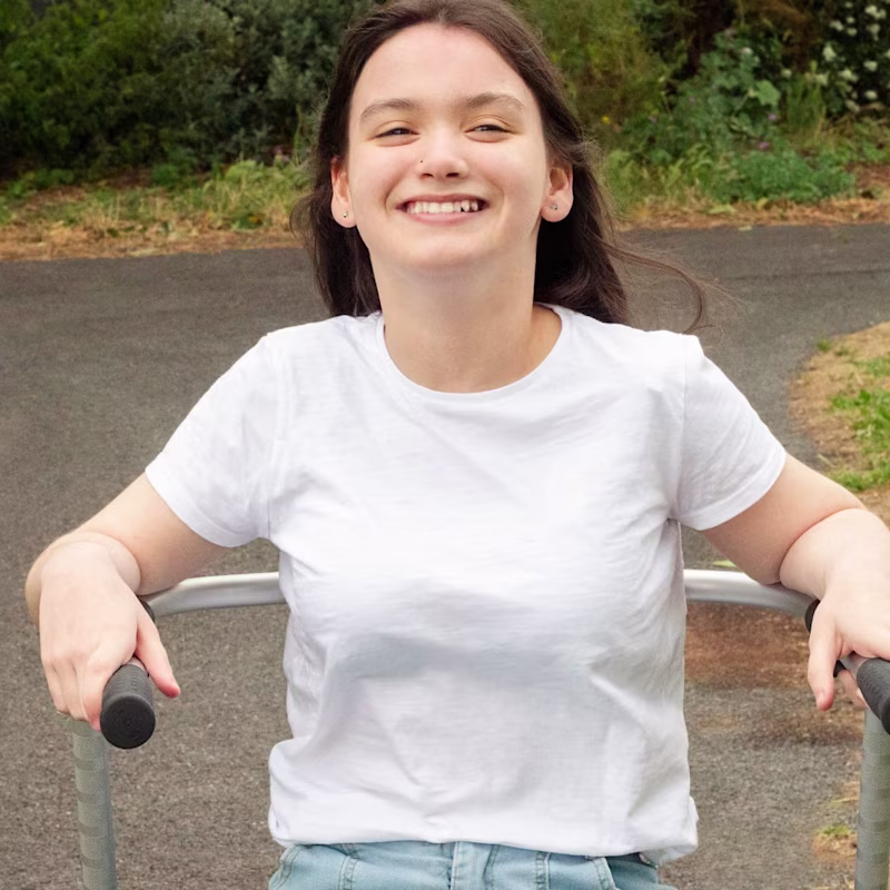 Cerebral Palsy patient walks with her walker