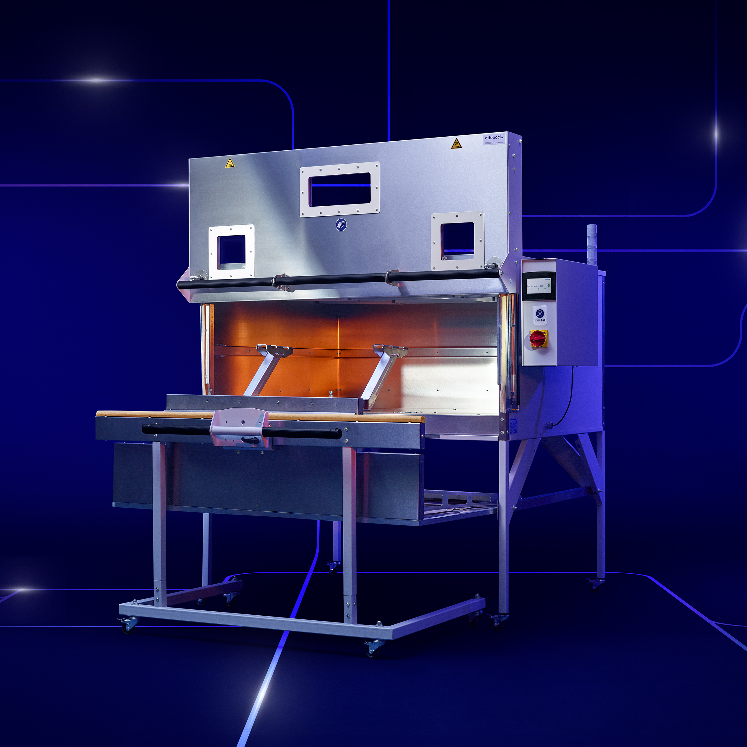 Side view of opened infrared oven against a dark backdrop within the Ottobock work.hub.