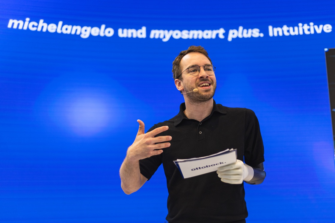 Andreas Onea presenting the Michelangelo hand and MyoSmart Plus prosthetic control system at an Ottobock event.